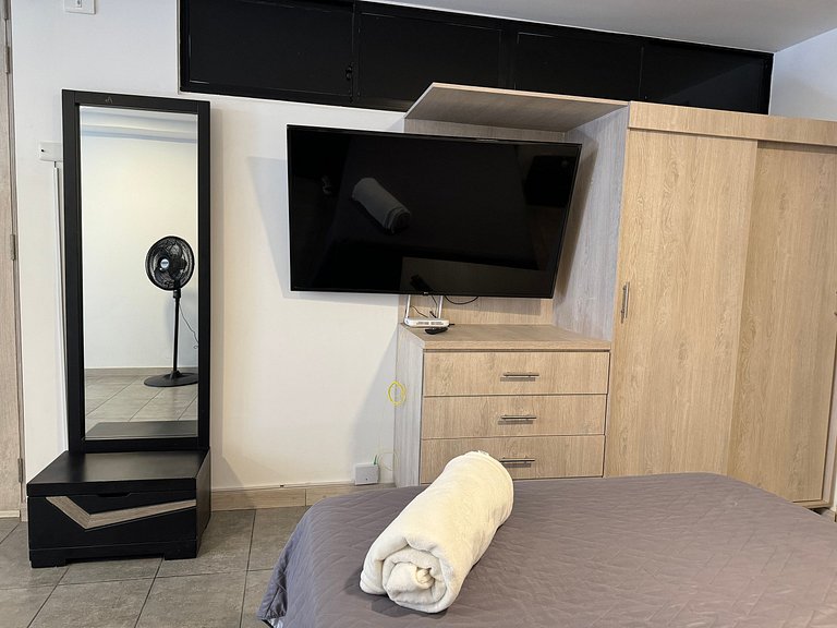 Condo centrico/ cama Queen/ Wi-Fi